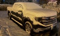 2025 GMC Sierra in the snow