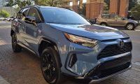 A 2025 Toyota RAV4 Hybrid strikes a handsome pose