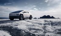 2025 Tesla Cybertruck Front 3-4 Quarters Silver Snow