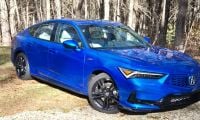 2026 Acura Integra A-Spec in blue features a stick-shift manual transmission