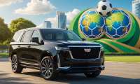 2026 Cadillac Escalade with 4,100 miles parked in front a FIFA World Cup sign in a city, rendition.