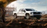 2027 Chevrolet Silverado 1500 Work Truck in Summit White. Exterior passenger front 34 beauty shot.