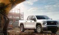 2027 Chevrolet Silverado 1500 Work Truck in Summit White. Exterior passenger front 34 beauty shot.
