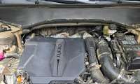The turbocharged, four-cylinder engine of a kia Telluride