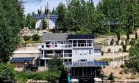 Home in British Columbia with multiple solar power installations. 