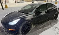Jordan's frozen Tesla Model 3 in a cold weather test