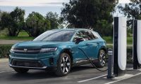 Honda Prologue EV at a Tesla Supercharger during road trip