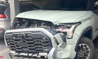 Jordan Taylor's 2025 Toyota Tundra after it was hit by another car and the grille completely damaged, and the insurance limit was only $25K.