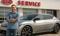 Kia EV6 owner in front of Kia service center