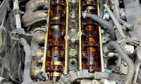 Lexus JZ engine teardown - dark oil stains , sludge buildup