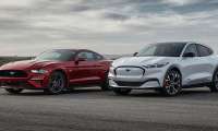 A regular Ford Mustang and an EV Mustang Mach-E parked side by side.