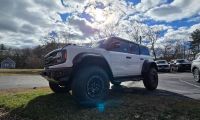 Image of a Ford Raptor looking like king of the hill
