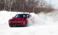 2026 Dodge Charger Throws up a rooster tail of snow on a rally course
