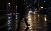 A generated image shows a man walking at night