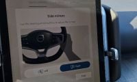 Image shows an EX30 from Volvo's mirror adjustment menu