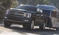 Ford F-150 Hybrid towing a boat