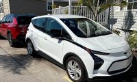 A Chevy Bolt is shown in a sunny Florida setting
