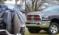 Austin's 2014 Ram 2500 and its upper shroud and other half is being chewed up by the fan