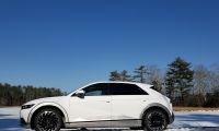 A Hyundai Ioniq 5 is shown on a snowy plain