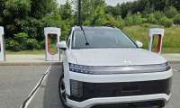 2026 Hyundai Ioniq 9 charges at a Tesla Supercharger