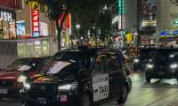 Japanese Vehicles at the Shibuya Intersection in Tokyo