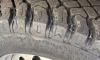 A discount tire with a bad outcome is shown on a Ford Bronco Sport