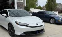 A 2026 Honda Prelude sits next to a Nissan 300ZX in an enthusiasts garage