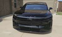 Front view of a black 2026 Lucid Gravity GT highlighting Lucid’s slim LED lighting and smooth front fascia.