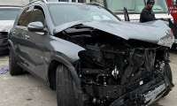 Laura’s Mercedes GLE 450e displayed after sustaining extensive front-end damage in a collision that activated multiple airbags.