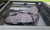A Ford Maverick Lobo is shown with a soft cargo bag in the bed.