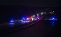 An image shows a nighttime crash on a highway