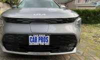 Gray Kia Niro front end view