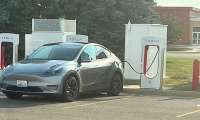 Scott's Tesla Model Y charging at a fast charger in MN