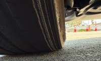 The rear inside of a Tesla Model Y Performance tire is fully worn