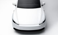White Tesla Model Y electric SUV front view on a clean minimalist background
