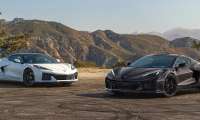 The 2027 Chevrolet Corvette Grand Sport Launch Edition in Arctic White and Grand Sport X in Pitch Gray Metallic positioned side by side sharing the same foundational Stingray DNA.