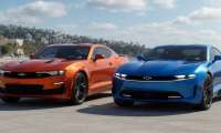 Two Chevrolet Camaros, old and new rendering, parked next to each other. Torque News imagination