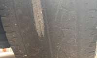 A Tesla Cybertruck's Pirellis tire is worn to the cords at just 17,000 miles