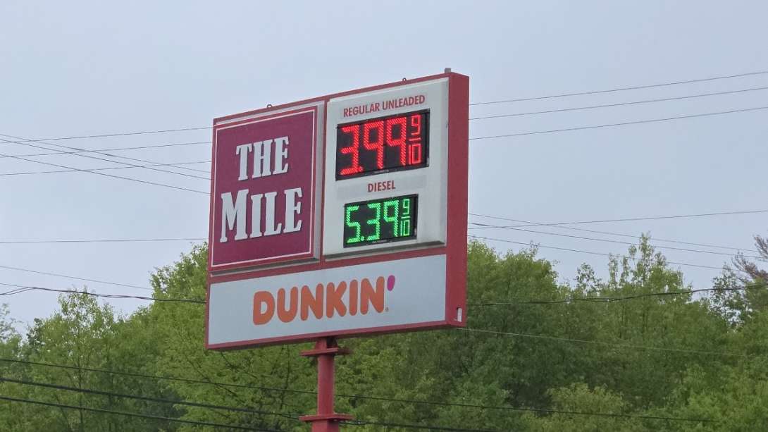 A gas price sign show $3.99 in Greenville New Hampshire