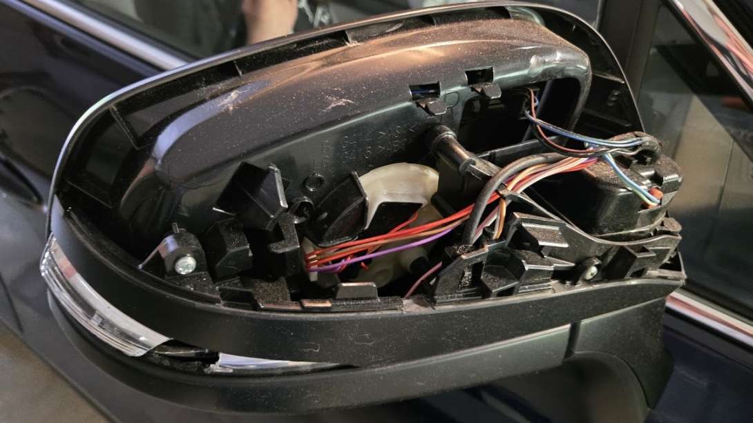 A damaged Toyota hybrid mirror