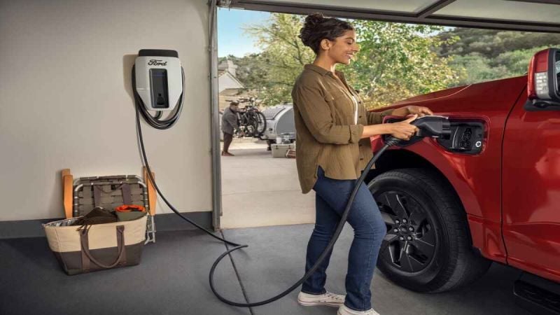 Ford, Honda, BMW Join To Form New EV Charging Network Charging a Ford Lightning Pickup